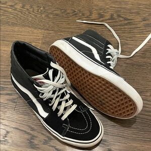 Vans Black and White High-Top Sneakers